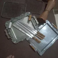 توری کباب پز و سیخ کوبیده