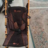 کالسکه بچه تاشو نارنجی با سبد خرید