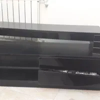 میز تلویزیون مدرن مشکی براق با خطوط طلایی در حد نو