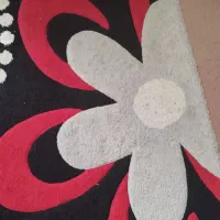 فرش فانتزی قرمز مشکی گل برجسته ۹ متری