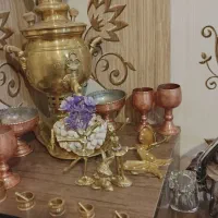 سمار برنج زغالی مجسمه های کوچلو . و لیوان مسی