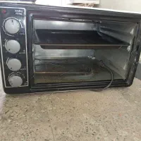 یک عدد ماکروفرمخصوص پیتزا درست کردن و ....|اجاق گاز و لوازم برقی پخت‌وپز|ایلام, |دیوار