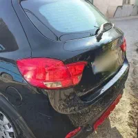 خودرو کوییک ار مشکی قرمز