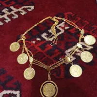فروش گردن‌بند هفت سکه