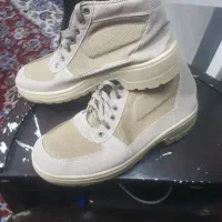 کفش چکمه ای|کیف، کفش، کمربند|اصفهان, عطار نیشابوری|دیوار