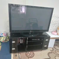 تلوزیون ۵۵اینچ با میز تلوزیون با گیرنده