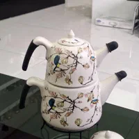 کتری و قوری تمام استیل هرمی و چینی وارمر دار|قوری، کتری، قهوه‌ساز دستی|تبریز, |دیوار