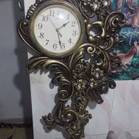 ساعت تزئینی بزرگ حدود ۸۰ سانت قد. ۶۵۰۰۰۰