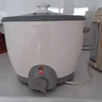 پلو پز ۶ نفره و آبمیوه گیری در حد نو