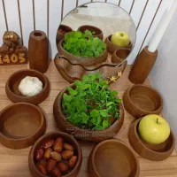 فروش انواع هفت‌سین،نماد سال،دکوری شمع وسنگ مصنوعی