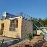 جوشکاری و نصب درب و پایه تانکر در باغ با موتور برق