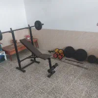 دستگاه بدن سازی چند کاره با دمبل و هالتر وزنه