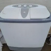 یک عددماشین لباس شویی دوقلو هفت کیلویی