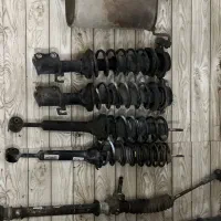 کمک پراید منبع اگزوز و جعبه فرمان