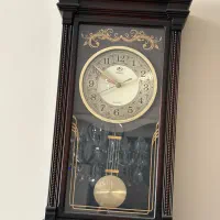 ساعت دیواری آونگ دار