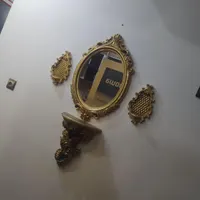 اینه و ساعت گچی
