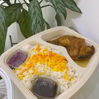 تهیه غذای میلانه با برنج محلی