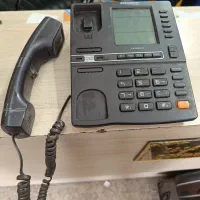 تلفن رومیزی و گاز تک شعله کوچک