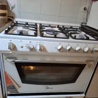 اجاق گاز فردار پنج شعله.درب شیشه ای