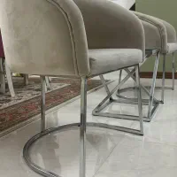 دوعدد صندلی استیل با میزعسلی