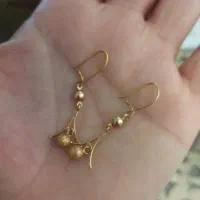 گوشواره دو جفت با دستبند النگو هم وزنش معاوضه دارم
