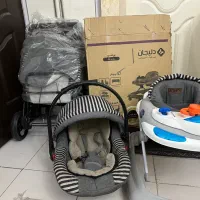 کالسکه وکریر روروئک وسرویس خواب وتشک بازی سیسمونی