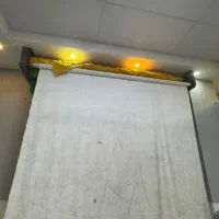 پرده عکاسی برقی کنترلی