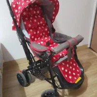 کالسکه و پشه بند نوزادی