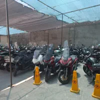 منشی پارکینگ موتور و کارواش