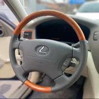 تودوزی و چوب و چرم فرمان