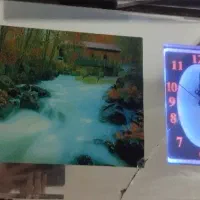 ساعت دیواری با تصویر نوری زیبا و صدای دلنشین|ساعت دیواری و تزئینی|اندیمشک, |دیوار