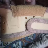 گردنبد طبی سخت کیف پولی کفش میخی فوتبال