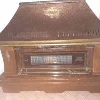 بخاری طرح شومینه پایه چوبی|بخاری، هیتر، شومینه|فردیس, شهرک راه آهن|دیوار