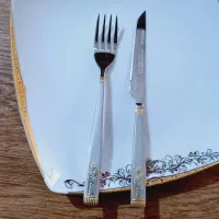 قاشق و چنگال کارد و چنگال هخامنش طلایی مارک نیوهوم