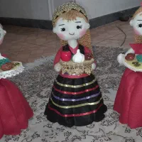 عروسک هفت سین به دست