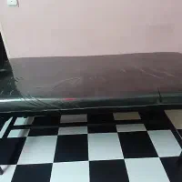 تخت ماساژ و تتو به همراه صندلی چرخدار