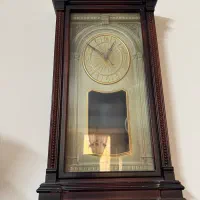 ساعت دیواری آونگ دار