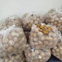 گردو مغز گردو  وخرما  بدون هسته