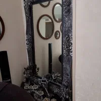 کنسول  و آینه و شمعدان
