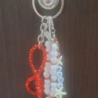 آویز کیف و جاکلیدی پاپیون قرمز