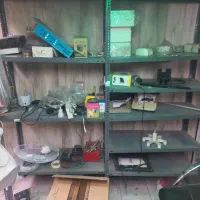 قفسه ۲۰در۹۰دو متر در ۲متر و میز شیشه ای