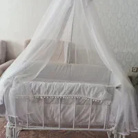 گهواره کنار تختی