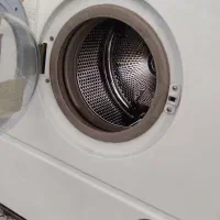 یک عدد لباسشویی و فریزر