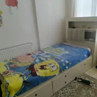 یک تختو میزش ویه تخت خوابه تک