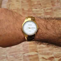 ساعت رادو طلایی وتسبیح عقیق