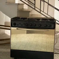 اجاق گاز ۵ شعله فردار تمام چدن لعاب