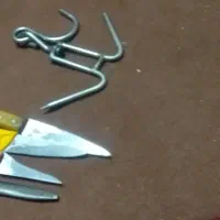 تعدادی چاقو چنکل تیز کن قصابی