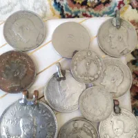 فروش چندسکه قدیمی ویک عددسنگ سلیمانی
