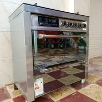 اجاق گاز پنج شعله تکنو با صفحه شیشه ای