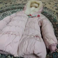 کاپشن و کیسه خواب کودک